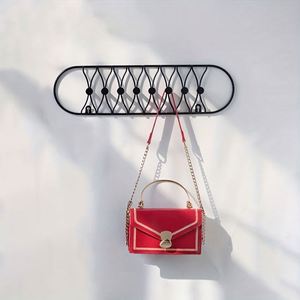 WEKIS - Estante de Pared de Alambre Metálico Negro Ovalado, Simple y Decorativo para el Hogar, con 8 Ganchos, Diseño Flexible Ecológico, Multiusos, Venta al por Mayor - Product Image 5