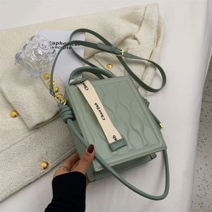 2023 Best Seller Versatile <b>Small</b> Crossbody Biscuit Bag Handheld PU with Vintage Chains Letter Decoration for Summer Fashion - Product Image 4