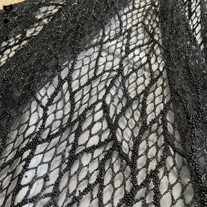 Nuovo Tessuto in Tulle Nero con Motivo a Foglie, Pizzo Africano con Perline e Paillettes - Product Image 1