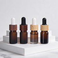 Vente en gros de flacons en verre borosilicate de petite capacité avec logo personnalisé, 20 ml, 30 ml, 50 ml, compte-gouttes, cosmétiques, soins de la peau, sérum essentiel