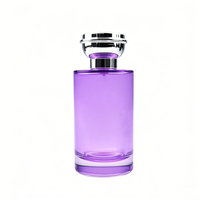 Flacon de parfum en verre cylindrique de luxe 50 ml 100 ml vide rond avec différents bouchons et vaporisateurs pour sérigraphie