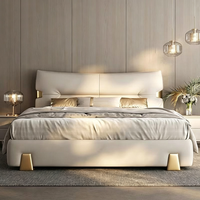 Lit de Luxe Moderne en Cuir Véritable Italien pour Chambre Parentale, Cadre de Lit Capitonnée King Size avec Garniture Dorée et Rangement