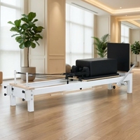 Machine de Pilates Reformer professionnelle en aluminium avec résistance réglable pour l'entraînement en studio et à domicile