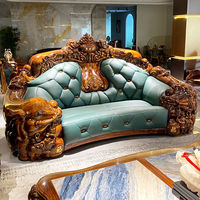 Canapé en cuir véritable haut de gamme de style chinois moderne, en cuir de vachette pleine fleur, avec structure en bois massif noir et or, pour salon domestique