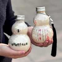Bouteille en plastique transparent jetable en forme de gourde pour la boisson froide de l'animal de compagnie