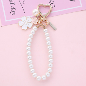 Hot <b>Sale</b> Alloy Enamel Cute Flower Keychain Letter Chain Charms Pendant Key Chains Pearl Chain Bag Decoration Keychain - Product Image 4