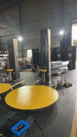 Machine d'emballage automatique électrique PLC pour film étirable avec presse supérieure pour emballer les cartons en bois, les textiles, les vêtements, les produits chimiques et les aliments