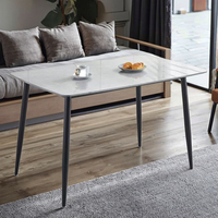 Bon marché, vente en gros, dessus en marbre européen, pieds en métal, ensemble table à manger moderne de luxe pour meubles de maison, usage hôtelier, 6 places durables