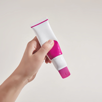 Tubo cosmetico ovale funzionale in plastica con tappo applicatore massaggiante in silicone per maschera viso e crema depilatoria