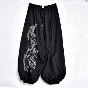 Pantalones de Esquí Negros Reflectantes con Estampado Tribal, Resistentes al Viento, de Alta Calidad, con Forro Interior Cálido, Cintura con Cordón Ajustable y Puños Elásticos - Product Image 1