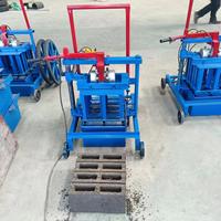 Machine de fabrication de briques creuses autobloquantes à pression hydraulique, populaire au Cameroun, pour la fabrication artisanale de blocs en sable et ciment usagés