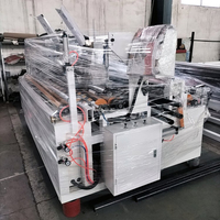 Machine de rembobinage, de découpe et de perforation de papier toilette contrôlée par PLC avec moteur à engrenages et roulement