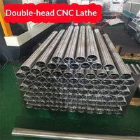 Tour CNC à double broche personnalisable pour la production rapide de rouleaux en alliage d'aluminium et l'usinage de cylindres industriels
