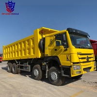 Sinotruk Howo 8x4 baru truk sampah berat Camion Benne Basculante Volquete Euro 5 standar emisi Diesel weiyai mesin kiri