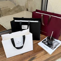 Sacs shopping en papier de luxe personnalisés avec poignées pour boutique de vêtements pour femmes, salon de beauté, emballage cadeau