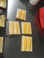 Nieuwe broodsnij- en vulmachine voor room, jam, maïs & ei - broodsnijmachine, eenvoudig te bedienen voor gebruik in bakkerijen