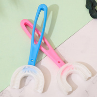 Brosse à dents pour bébé Tête de brosse en silicone en forme de U Nettoyage des dents pour enfants de 2 à 12 ans