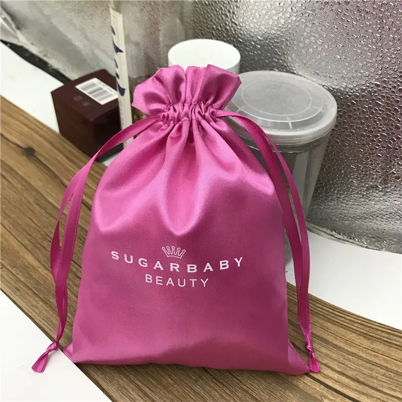 Custom barbie pink satin silk drawstring bag with white logo for cosmetic/eyeshadow