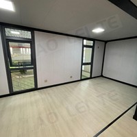 Maison de conteneur pliable extensible à deux étages électrique préinstallée avec escalier intérieur pour villa ou hôtel de luxe