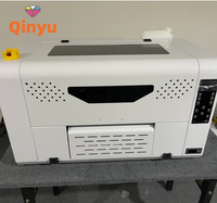 Qinyu terlaris Digital Dual XP600 DTF Printer A3 T-shirt mesin cetak A3 DTF Inkjet Printer untuk kain tekstil pencetakan