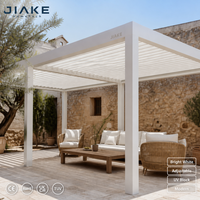 Pergola blanche Jiake avec toit à lames orientables et auvent en aluminium pour un gazebo moderne en plein air, un patio ou un jardin