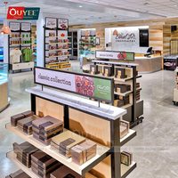 Éclairage de magasin en libre-service à l'aéroport, comptoir en verre, vitrine à chocolat, table à bonbons, étagère en gondole, présentoir mural pour magasin à domicile
