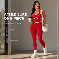 Mono de yoga de una pieza para mujer con ribete en contraste, espalda abierta, efecto moldeador y realce de glúteos, ideal para correr y gimnasio.