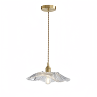 Estilo nórdico moderno minimalista latón colgante luz creativa hoja de loto cristal LED cabecera cobre Villa hogar Oficina