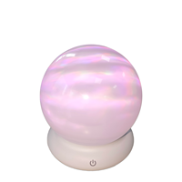 Projecteur d'ambiance moderne en gros avec télécommande et prise en charge de l'application pour une lumière nocturne effet clair de lune