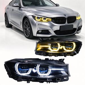 ไฟหน้ารถยนต์ AKD สำหรับ BMW ซีรีส์ 3 GT - F34 แบบ Angel Eye สีเหลืองขาว สไตล์เลเซอร์ พร้อมชุดเลนส์ LED คู่ - Product Image 1