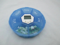 Nouveau Style rond sept compartiments boîte à pilules électronique rappel de médicaments Portable minuterie réveil boîte à médicaments en plastique