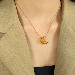 Conjunto de aretes y collar minimalistas con forma de luna, chapados en oro de 18 quilates, acero inoxidable, joyería unisex de moda. - Product Image 4