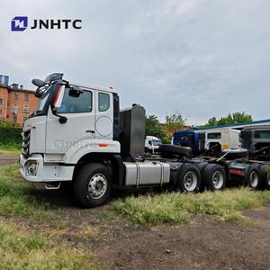 Tête de <span class=keywords><strong>camion</strong></span> Sino HOWO 6x4 tête de remorque cheval de remorquage Tanzanie nouveau <span class=keywords><strong>camion</strong></span> tracteur bon <span class=keywords><strong>prix</strong></span> - Product Image 1
