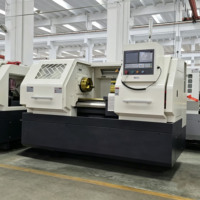 Tour CNC horizontal CK6150-1000 avec commande Fanuc/GSK, 2 axes, tourelle porte-outils automatique pour le tournage d'arbres