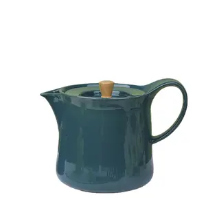 أدوات منزلية إبريق شاي للبيع المباشر من المصنع أخضر داكن سلع منزلية هدية للزفاف طقم شاي قهوة إبريق شاي خزفي صيني بغطاء