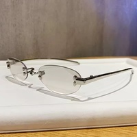 Lunettes de soleil ovales en métal sans monture, nouvelle collection 2026, style tendance européen et américain, même style que les influenceurs Instagram.