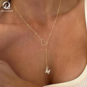 Raffinato Ciondolo Personalizzato alla Moda in Acciaio Inossidabile Dorato a Forma di Cuore <span class=keywords><strong>con</strong></span> Catena a Y <span class=keywords><strong>e</strong></span> <span class=keywords><strong>Perline</strong></span> <span class=keywords><strong>con</strong></span> Iniziale in Zirconia Cubica per Donna - Product Image 1