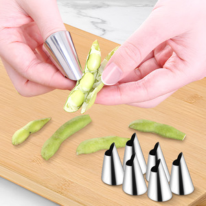 Pelador de verduras, pelador de jengibre, pelador de ajo, pelador de edamame, protector de dedos, utensilio de cocina anti-corte de acero inoxidable. - Product Image 1