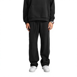Pantalon de jogging décontracté pour homme en coton noir, taille élastique avec cordon de serrage, poches latérales, tricoté mi-lourd et respirant pour l'automne - Product Image 1
