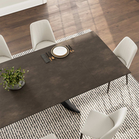 Table à manger rectangulaire extensible en pierre frittée avec pieds en acier au carbone au design unique, très vendue pour la maison