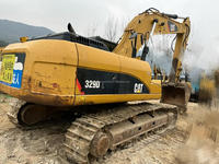 Excavatrice d'occasion Caterpillar 329DL, 29 tonnes, sur chenilles, avec godet hydraulique et attache rapide pour travaux de terrassement et de construction