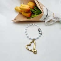 Ensemble collier et bracelet HC en acier inoxydable avec pendentif cœur ajouré, fermoir épingle de sûreté bicolore, bijoux de mode pour femmes, vente en gros