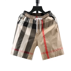 All'ingrosso 100% poliestere in tela a metà vita traspirante <span class=keywords><strong>pantaloncini</strong></span> da <span class=keywords><strong>uomo</strong></span> Casual <span class=keywords><strong>con</strong></span> <span class=keywords><strong>tasche</strong></span> stampate da spiaggia estiva - Product Image 1