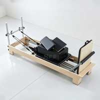 Machine de Pilates Reformer en bois d'érable en gros avec conception de demi-tourneuse semi-élevée pour usage en studio de Pilates