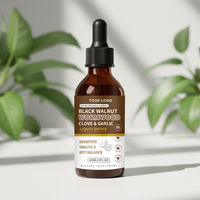 Gouttes liquides à base de plantes avec extrait de noix noires, d'armoise, de clou de girofle et d'ail pour le soutien digestif – Complément alimentaire OEM ODM