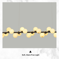 Magnifique lampe suspendue linéaire en sphère d'albâtre contemporaine, globe lumineux en marbre pour hall d'hôtel, villa, foyer