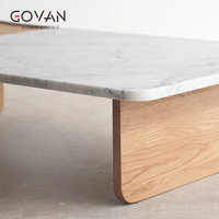 Table basse en marbre et bois massif de style nordique, idéale pour les zones d'accueil à domicile et les hôtels