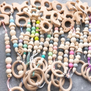 Collar de <span class=keywords><strong>mordedor</strong></span> para bebé ecológico a la moda, colgante de madera de haya Natural, diseño de fútbol de grado alimenticio, accesorio Molar infantil de madera - Product Image 5