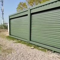Boutiques préfabriquées mobiles en kit, garage, entrepôt pour voitures, maison modulaire en conteneur avec porte enroulable à automatisation manuelle