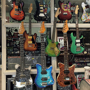 Petite guitare en bois Jouets pour enfants Mélangée à plusieurs couleurs Guitare électrique originale - Product Image 6